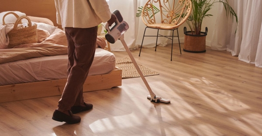 vacuuming bedroom